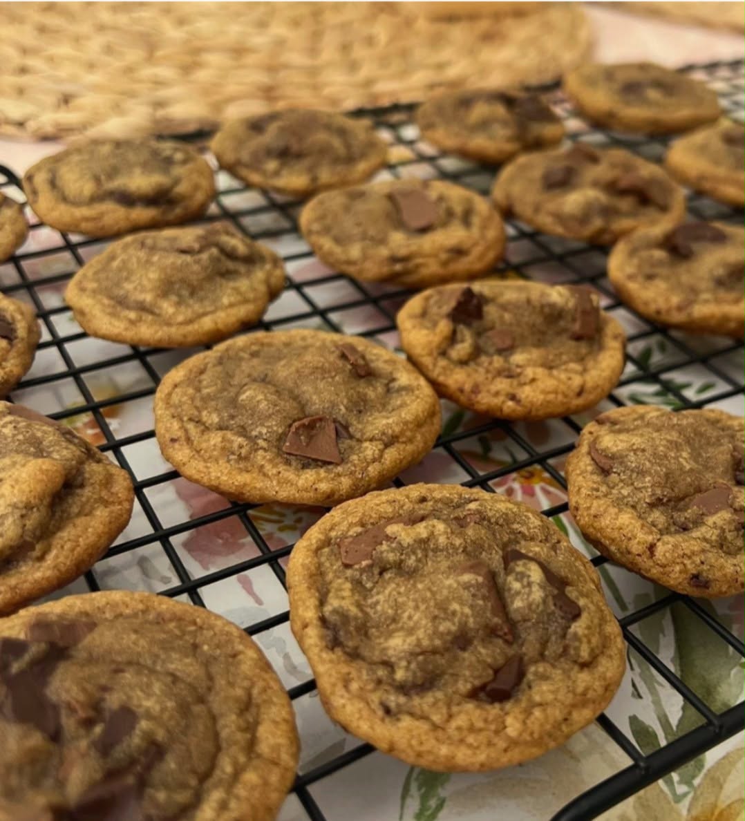 Classic chocolate chunk cookies cooling on a wire rack